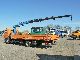 MAN  12 220 4X2 flatbed with 9 meters MKG crane 2001 Stake body photo
