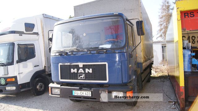 1995 MAN  1223 Truck over 7.5t Stake body and tarpaulin photo