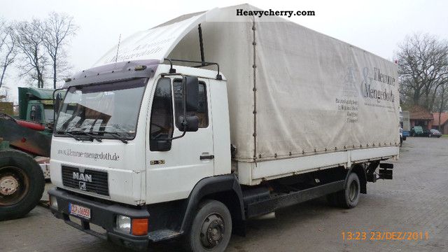 1994 MAN  8153 with tail Van or truck up to 7.5t Stake body and tarpaulin photo