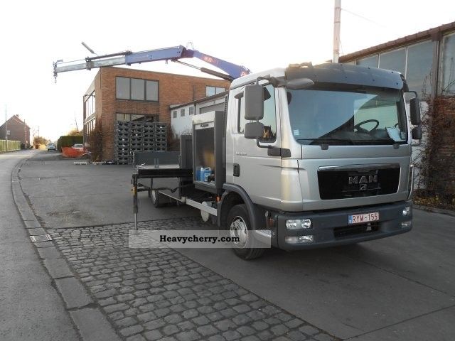 2010 MAN  TGL 12.210 4X2 B-L Truck over 7.5t Stake body photo
