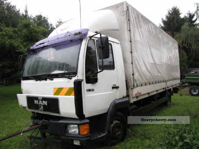 2000 MAN  9163 Truck over 7.5t Stake body and tarpaulin photo