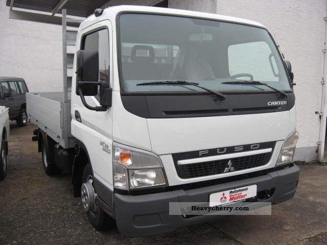 2011 Mitsubishi  Fuso Canter 3C13 flatbed trailer coupling Demonstration Van or truck up to 7.5t Stake body photo