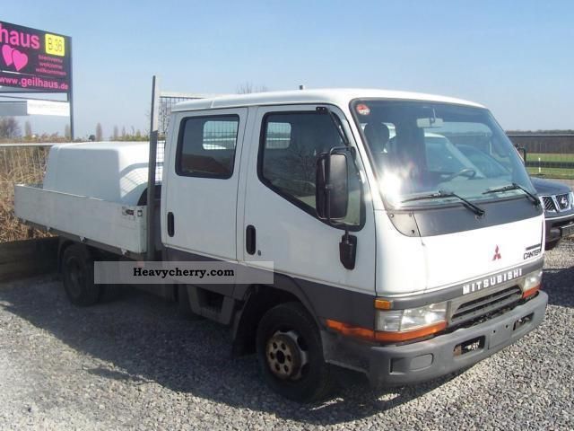 2001 Mitsubishi  CANTER 3.5 T Van or truck up to 7.5t Stake body photo