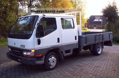 2005 Mitsubishi  Canter 3.0 Di-D, 7 seats Van or truck up to 7.5t Stake body photo
