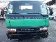 2004 Mitsubishi  Canter FE659 with Hook Container / D FZG Van or truck up to 7.5t Roll-off tipper photo 2