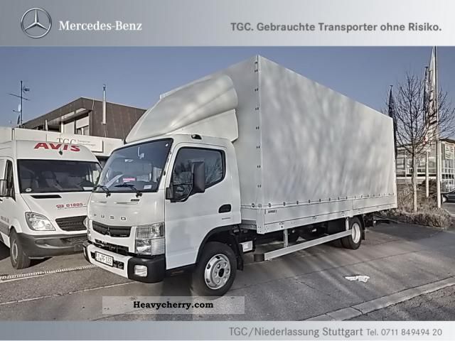 2012 Mitsubishi  Fuso Canter 7C15 type LBW Van or truck up to 7.5t Stake body and tarpaulin photo