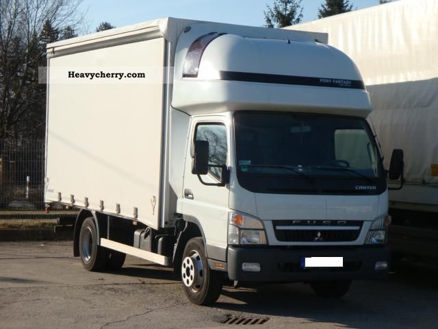 2010 Mitsubishi  FUSO Canter 7 C18 Top Sleeper Van or truck up to 7.5t Stake body and tarpaulin photo