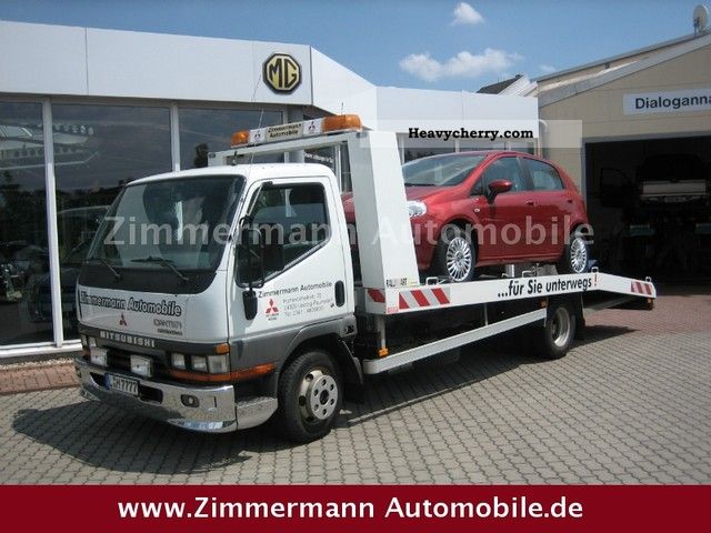 1998 Mitsubishi  Canter tow / roadside assistance vehicle Van or truck up to 7.5t Car carrier photo