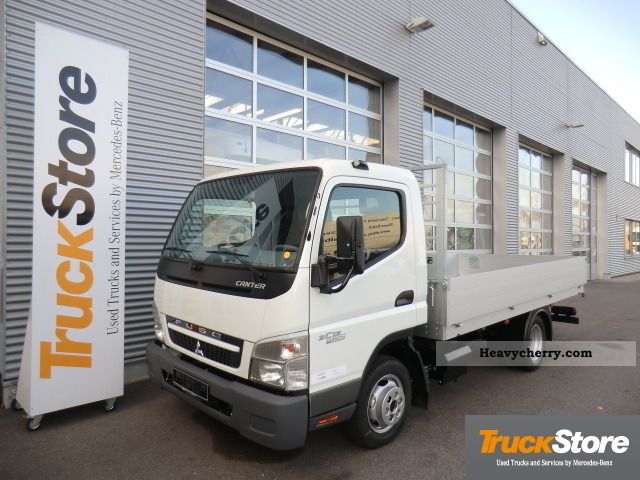 2011 Mitsubishi  CANTER 3C13 Van or truck up to 7.5t Stake body photo