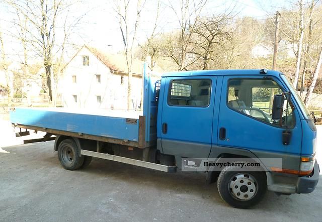 1999 Mitsubishi  Canter Van or truck up to 7.5t Stake body photo