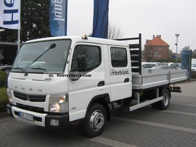 2012 Mitsubishi  Fuso Canter 7C18D * Air / payload 4.255kg * Van or truck up to 7.5t Stake body photo