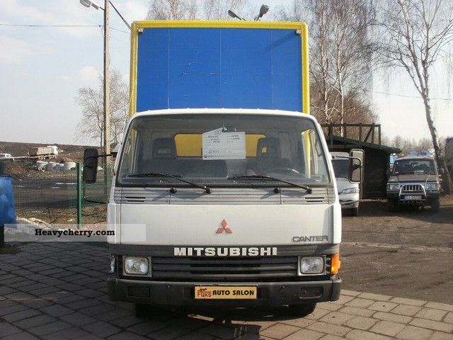1995 Mitsubishi  Canter Van or truck up to 7.5t Stake body and tarpaulin photo