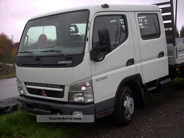 2010 Mitsubishi  3C13 Doka € 5 Van or truck up to 7.5t Stake body photo