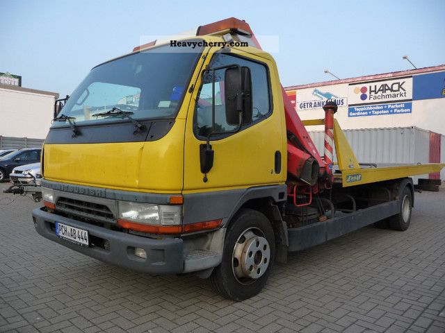 2000 Mitsubishi  Canter TOWING VEHICLE WITH CRANE Truck over 7.5t Breakdown truck photo