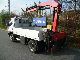 2004 Mitsubishi  Canter 7C14 with HMF rear loading crane Van or truck up to 7.5t Stake body photo 3