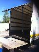 1998 Nissan  Truck l 35 Van or truck up to 7.5t Stake body and tarpaulin photo 2