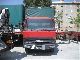 1996 Nissan  M115-180 Truck over 7.5t Stake body and tarpaulin photo 1