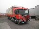 Scania  P94 300 4x2 platform and tilts 2000 Stake body and tarpaulin photo