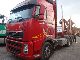 Volvo  FH 12 460 short timber truck with crane 2004 Timber carrier photo