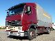 Volvo  FH12-340 4x2 P + tilt switch tail lift 1994 Stake body and tarpaulin photo