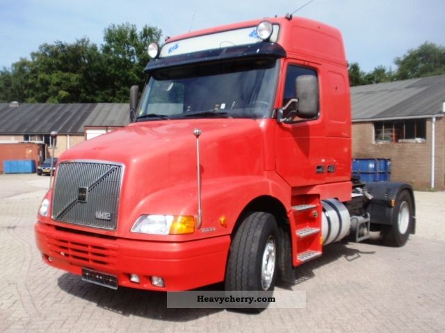 2002 Volvo  NH12-460HP + Globetrotter Manuel retarder Semi-trailer truck Standard tractor/trailer unit photo