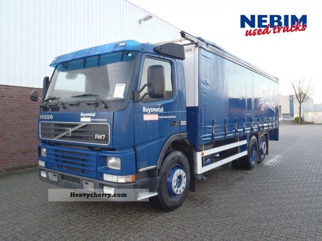 1999 Volvo  FM7 290 € 2 6x2R 589.642Km Truck over 7.5t Stake body and tarpaulin photo