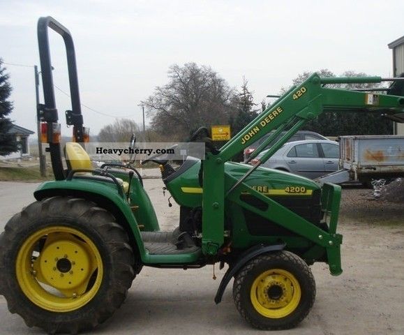 2011 John Deere  HS 4200 with front loader, hydraulic, drawbar Agricultural vehicle Tractor photo