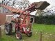 1970 IHC  353 with front loader Agricultural vehicle Tractor photo 1