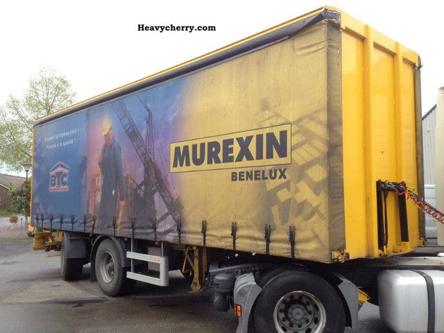 2009 Other  2 axis directed Semi-trailer Stake body and tarpaulin photo
