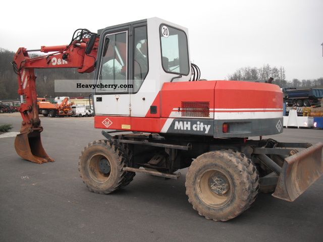 1998 Other  MH City Series B - Adjustable + Knickausleg Construction machine Mobile digger photo