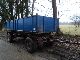 Other  18 tons of oil-2x side-dump trailer air suspension 1985 Three-sided tipper photo