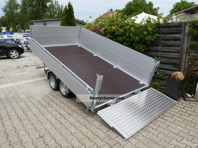 2012 Voss  retractable cargo area 3000KG 3-way tipper Trailer Three-sided tipper photo