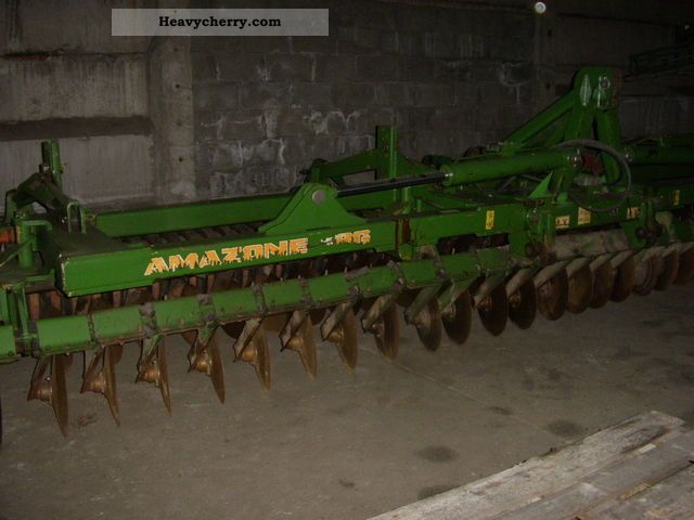 2003 Amazone  Catros 6001 Agricultural vehicle Harrowing equipment photo