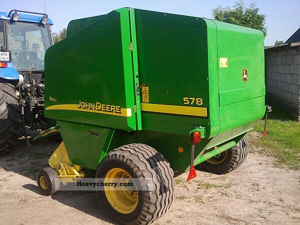 2004 John Deere  Prasa rolująca 578 Maxi Cut Agricultural vehicle Haymaking equipment photo