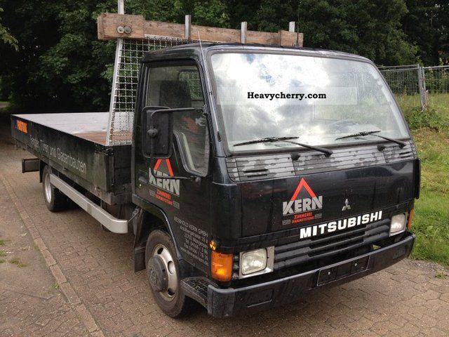 1991 Mitsubishi  Canter Van or truck up to 7.5t Stake body photo