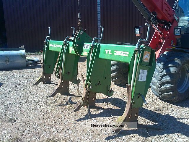 2002 Amazone  TL 302 Agricultural vehicle Harrowing equipment photo
