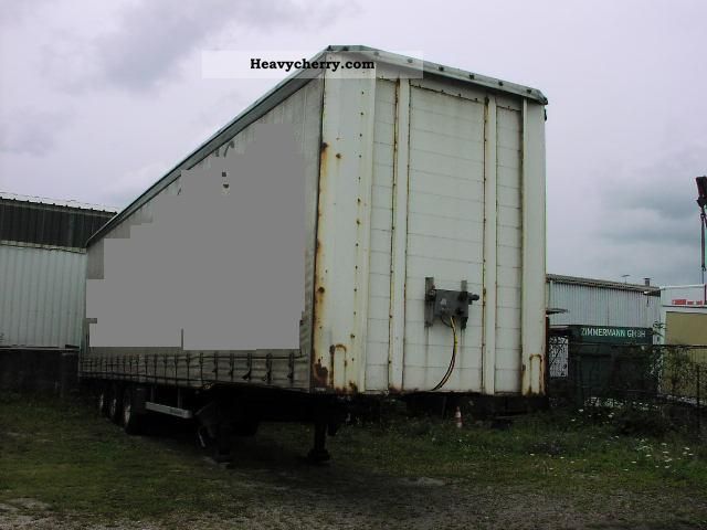 2002 Kotschenreuther  SPM MEGA-trailers Semi-trailer Stake body and tarpaulin photo