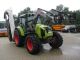 Claas  Axos 330 CX-wheel drive with front loader 2010 Tractor photo