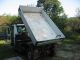 1999 Unimog  Ux 100 Van or truck up to 7.5t Three-sided Tipper photo 1