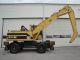 CAT  318MH 1999 Mobile digger photo