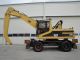 1999 CAT  318MH Construction machine Mobile digger photo 1