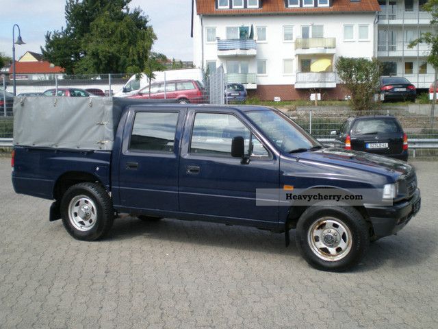 1996 Opel  Campo sportscap Pick Up 4x4 Van or truck up to 7.5t Stake body and tarpaulin photo