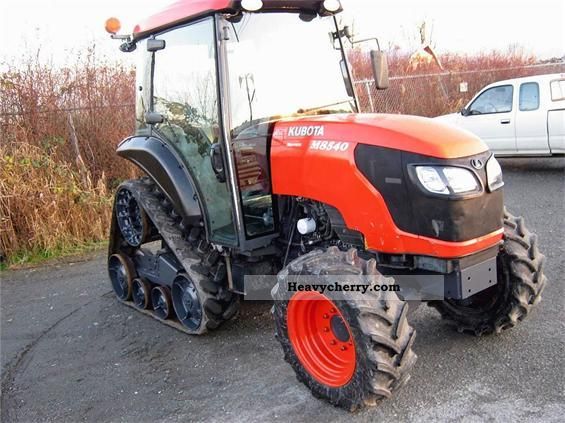 2009 Kubota  M8540NPK performance crawler 4WD Agricultural vehicle Tractor photo