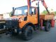1990 Unimog  U1250 with crane and basket work PK7000A Truck over 7.5t Tipper photo 1
