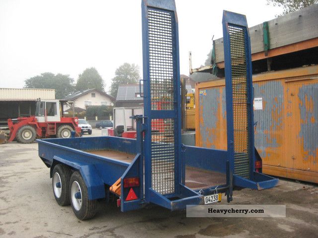 1993 Obermaier  T - 80 tandem trailer with ramps Trailer Low loader photo