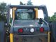 2010 John Deere  320D Agricultural vehicle Tractor photo 1