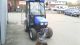 2002 New Holland  TC 21D Agricultural vehicle Tractor photo 8