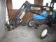 2006 New Holland  TN 75 FA with Stoll FL Agricultural vehicle Tractor photo 1