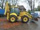 2002 New Holland  LB 115 B - 4 HP / hammer Line / Power Shift / climate Construction machine Combined Dredger Loader photo 1