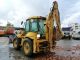 2002 New Holland  LB 115 B - 4 HP / hammer Line / Power Shift / climate Construction machine Combined Dredger Loader photo 4